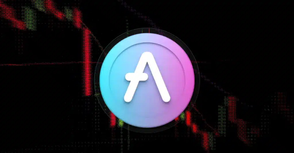 AAVE token logo on a backdrop of a red and green price chart.