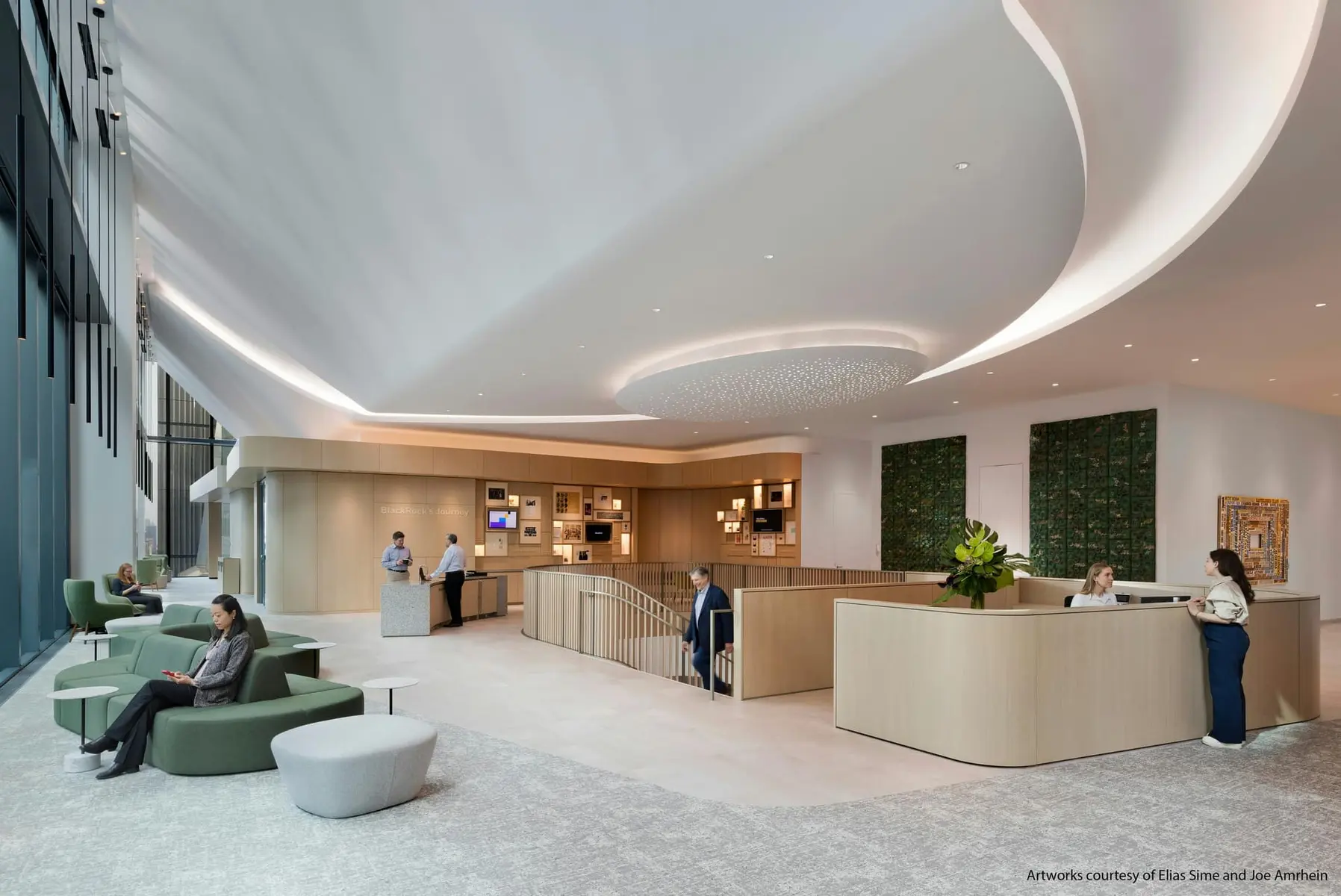 Interior view of BlackRock's modern headquarters lobby in New York.