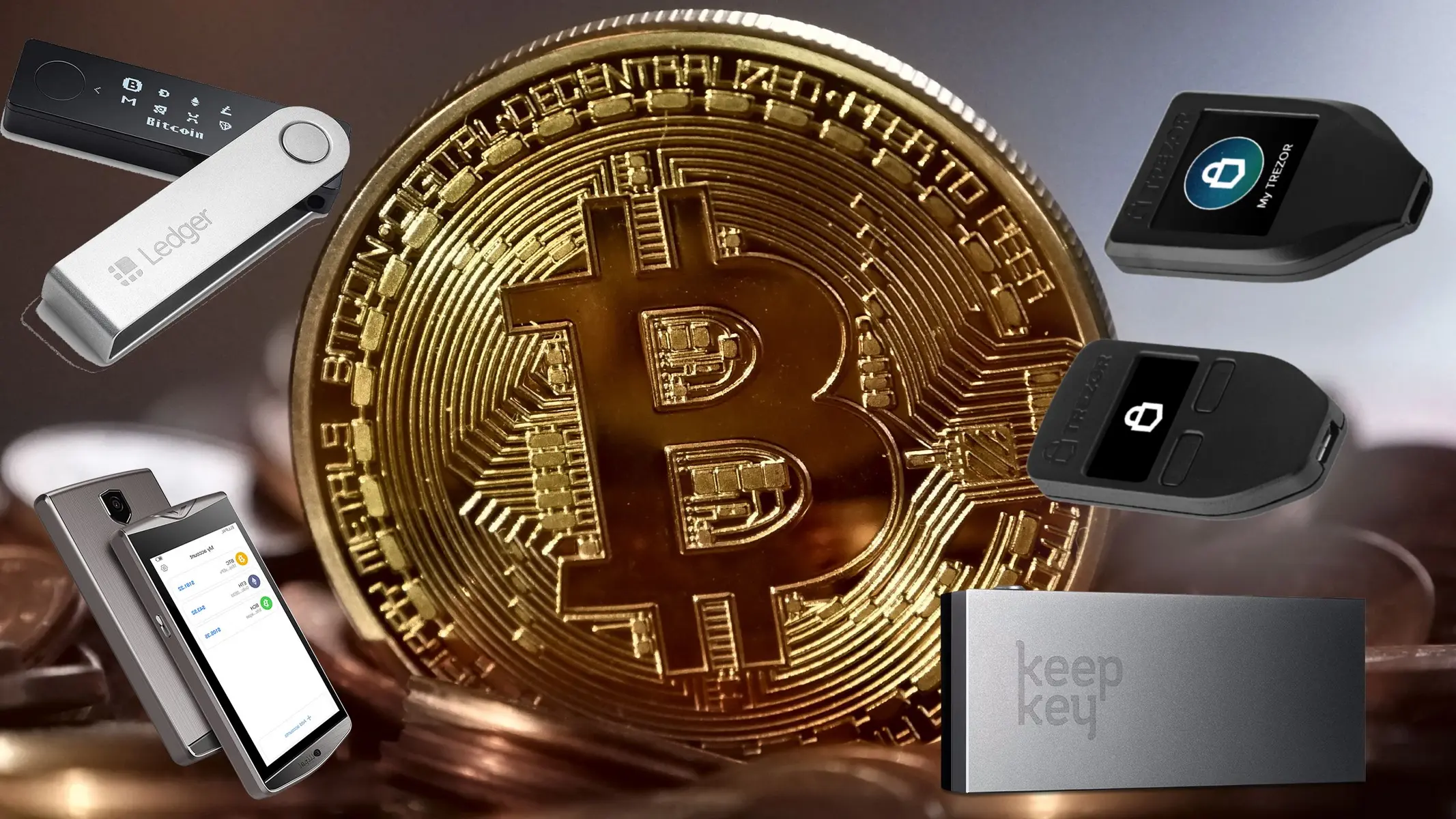 A large gold Bitcoin coin surrounded by Ledger, Trezor, and KeepKey hardware wallets.