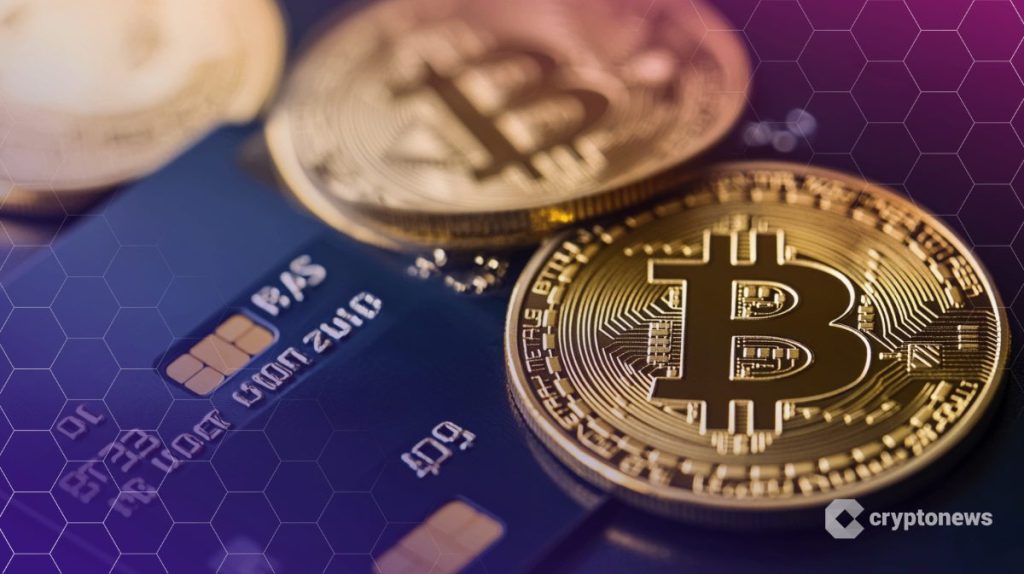 visa-kortti ja bitcoin kolikoita