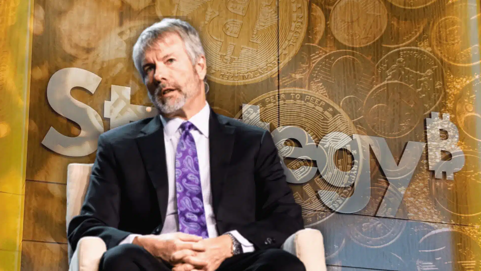 Michael Saylor speaking in front of a Bitcoin-themed background.