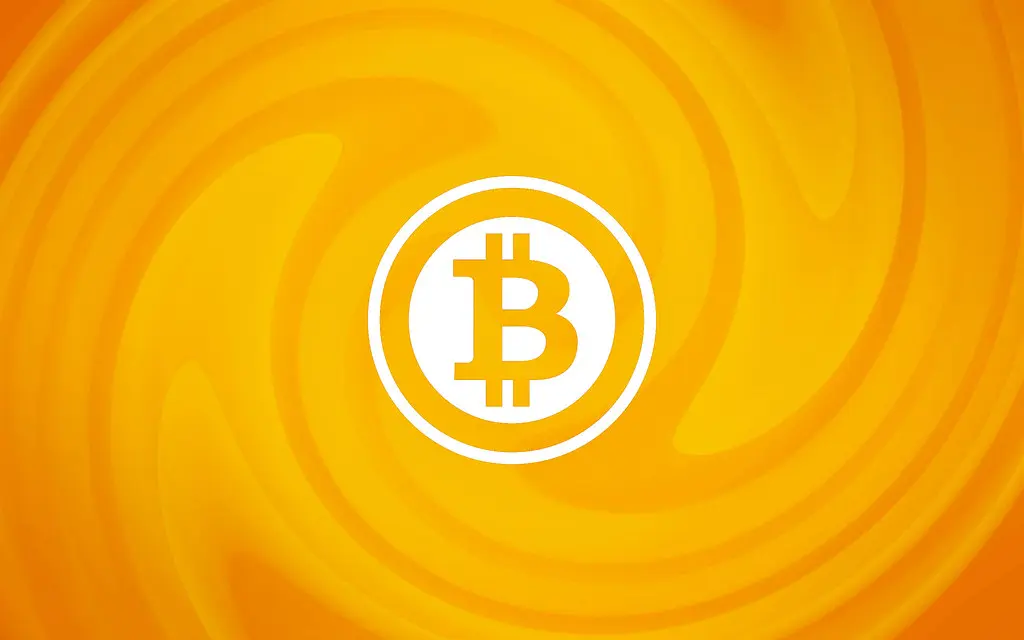 Het Bitcoin-logo in het midden van een oranje abstracte achtergrond