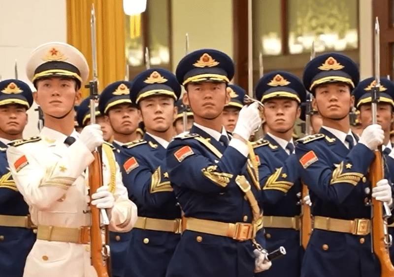 A ceremonial guard greets the President of Columbia at a state visit to Beijing following the conclusion of the Belt and Road Forum for International Cooperation.