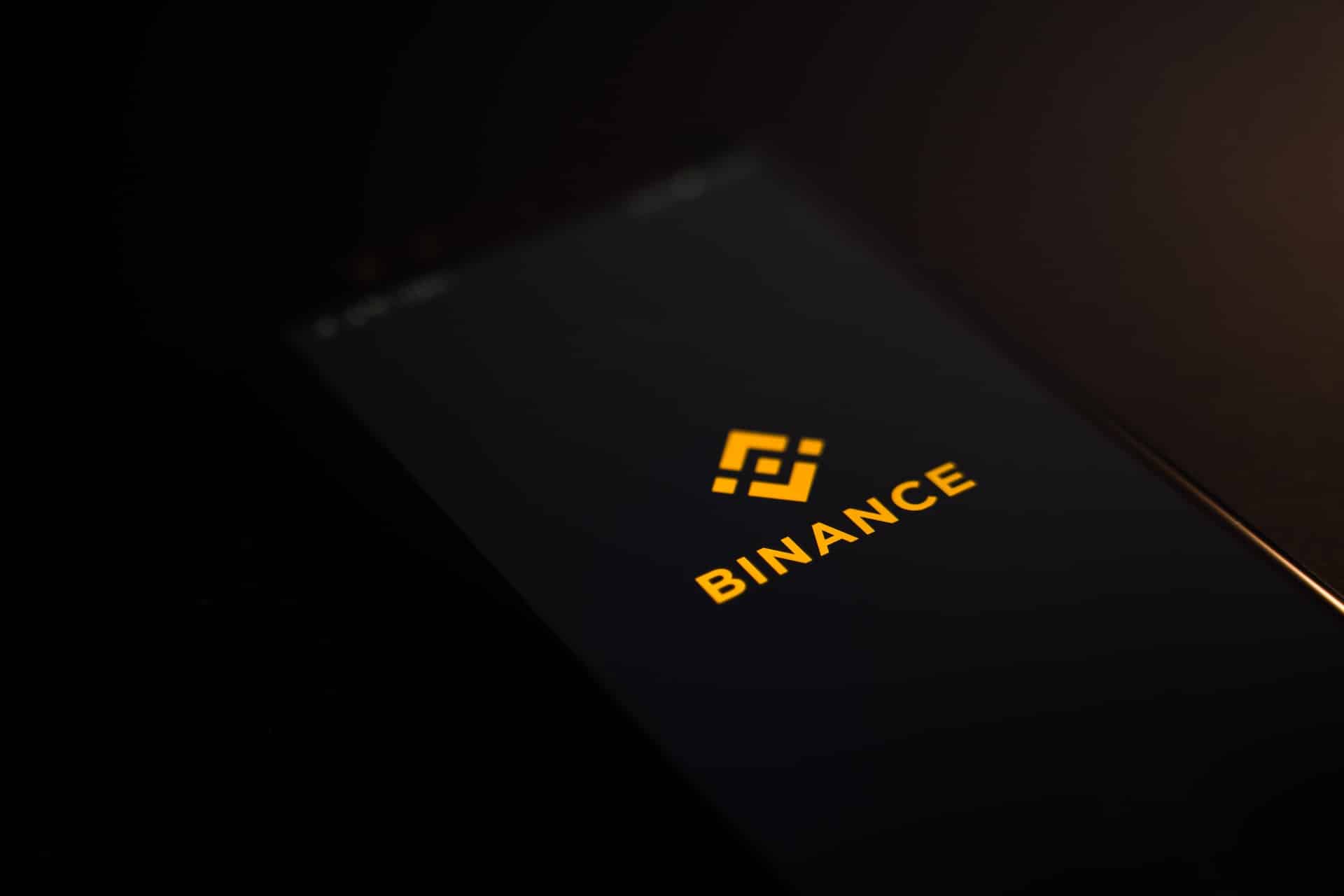 Binance mobile logo on a phone screen