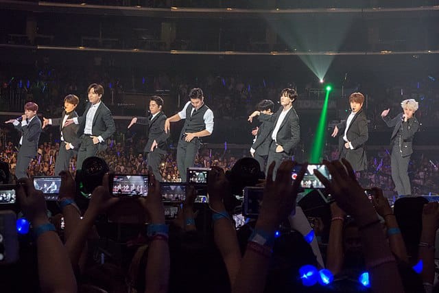 K-pop stars Super Junior performing on stage in 2015.