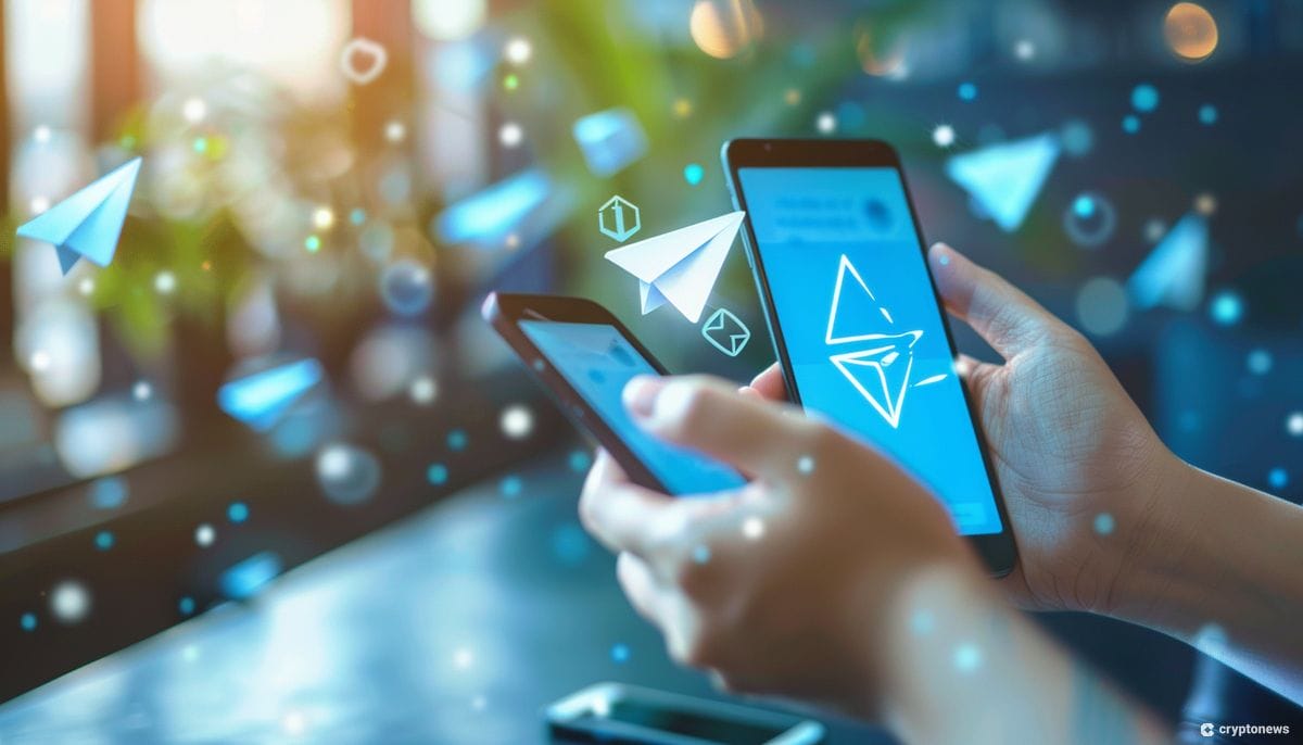 Two hands hold smartphones with the Telegram logo and a stylized ad icon, highlighting the integration of adsgram, a new advertising platform, within the Telegram app.