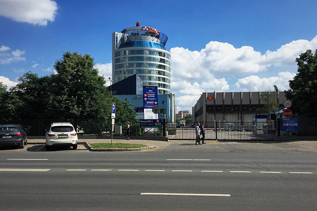 An office building of the Russian banking group Sovcombank, in front of which Russian citizens pass
