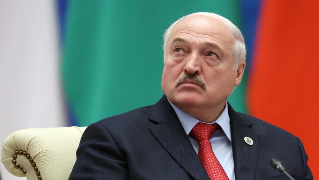 Belarisanian President Lukashenko looks on