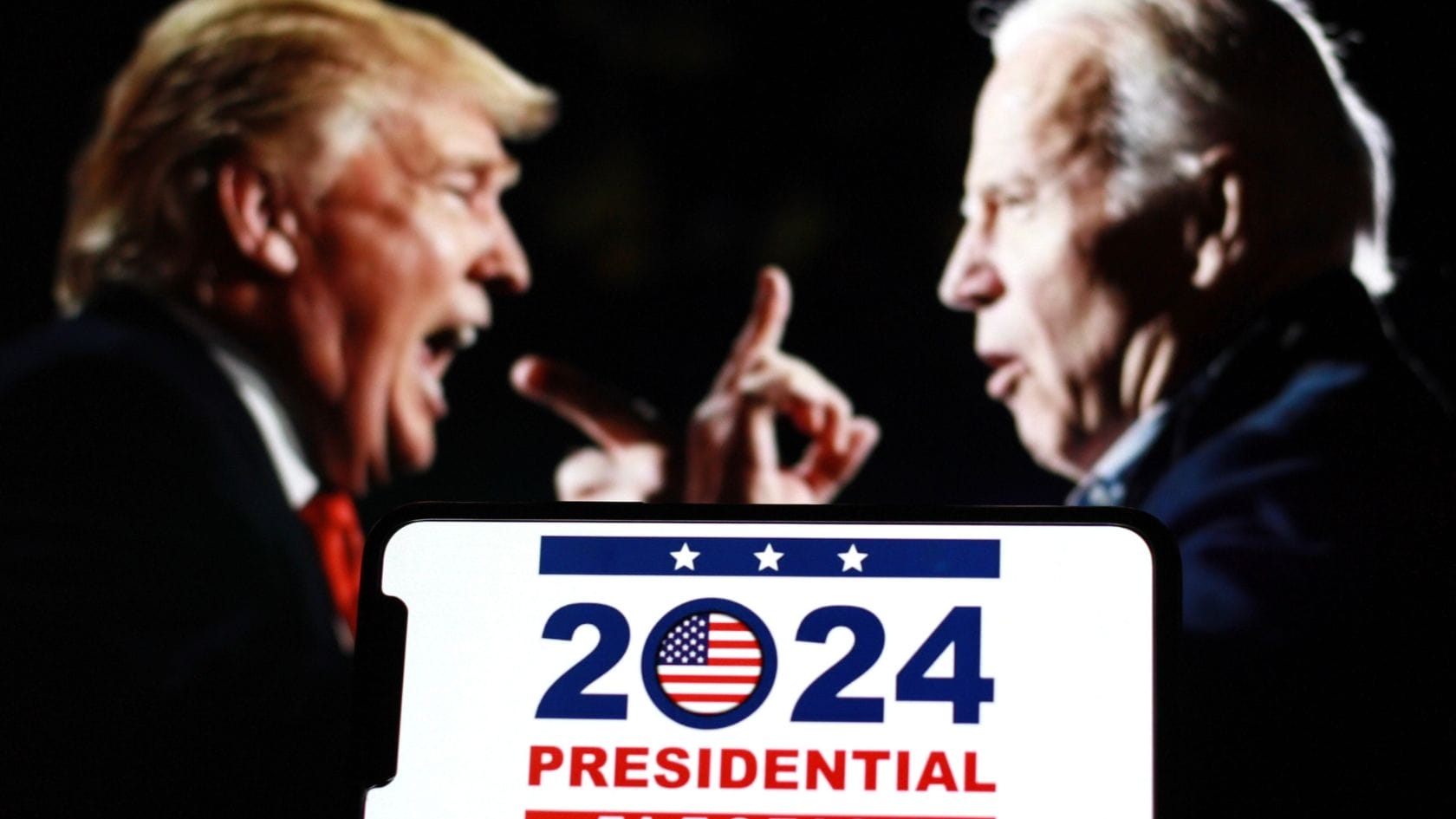 USA:n vaaliväittely -kuvassa Trump ja Biden huutavat kasvot vastakkain.