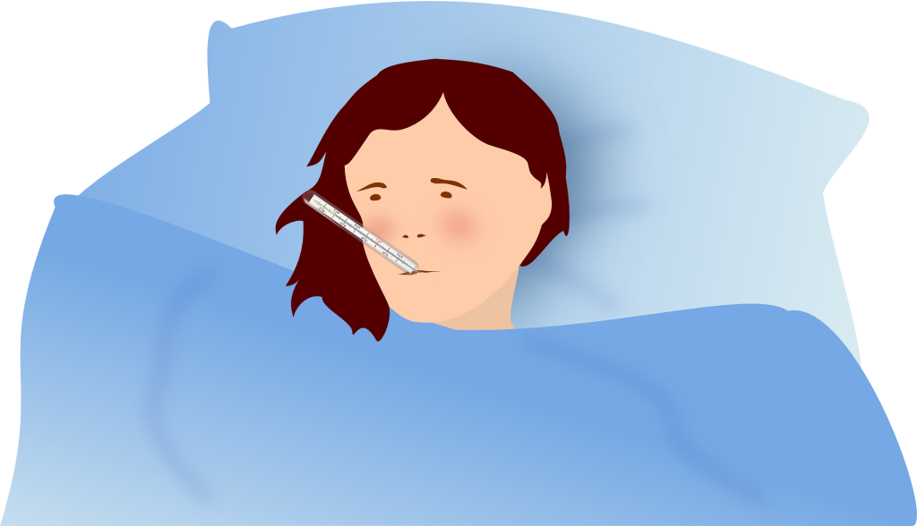 Kranke Frau im Bett
