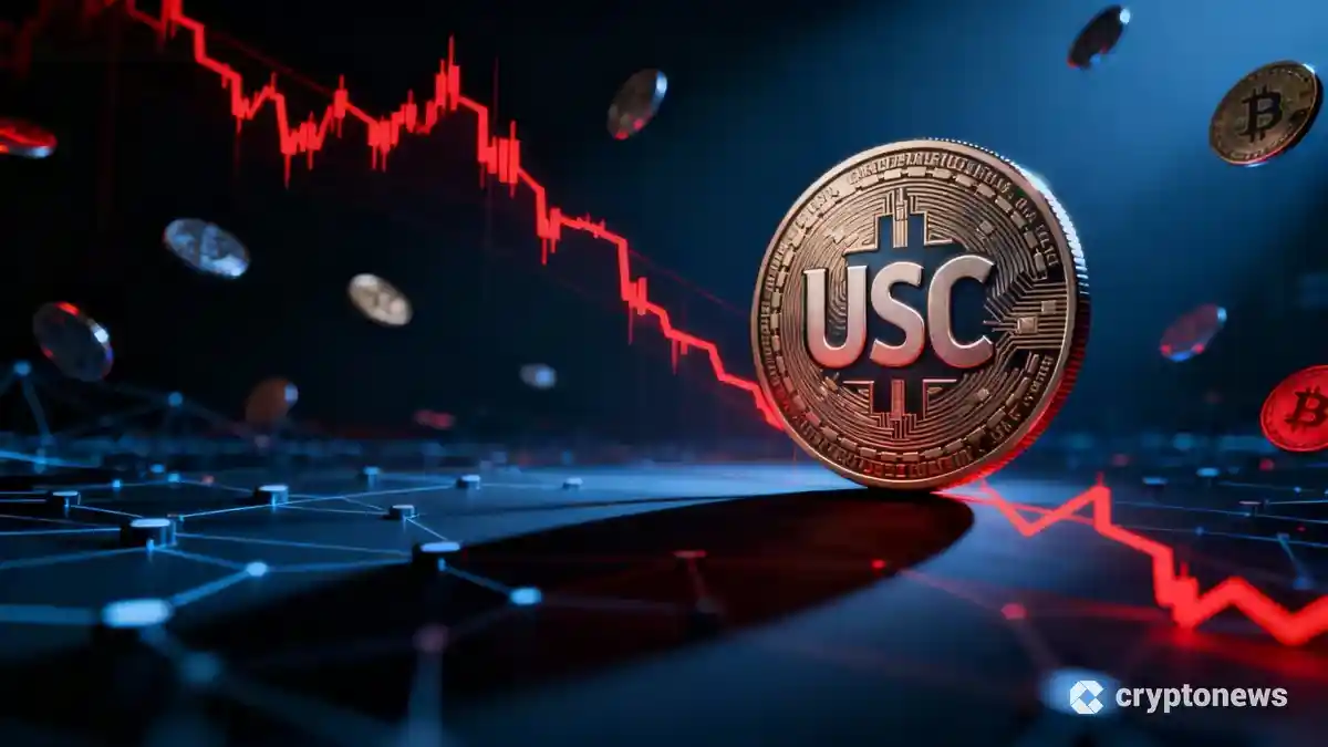 下落傾向を示すUSDCステーブルコインのシンボルと暗号資産ネットワーク