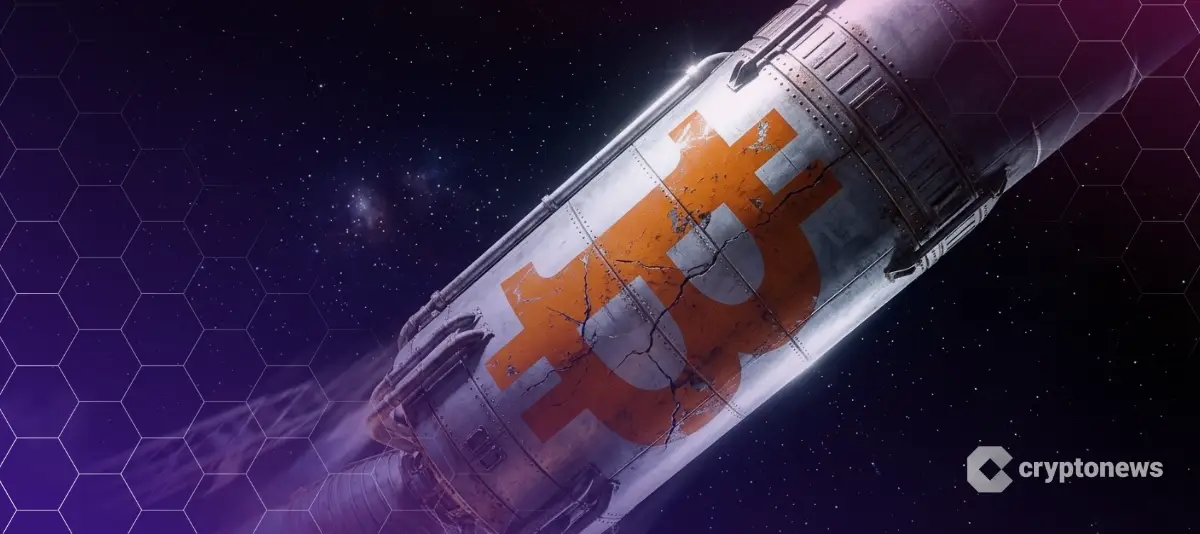 スペースXのロケットとひび割れたビットコインロゴ
